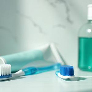 Oral hygiene tools arranged on bathroom counter