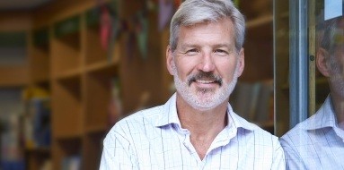 Man smiling after tooth replacement