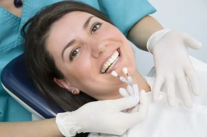 woman smiling in the dental chair