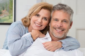 older couple embracing