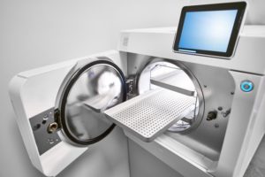autoclave in dental office, ready to sterilize instruments
