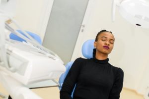 Female dental patient relaxing after procedure with nitrous oxide