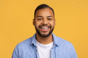 Portrait of smiling man with braces