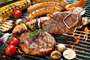Selection of tasty summer foods on a grill