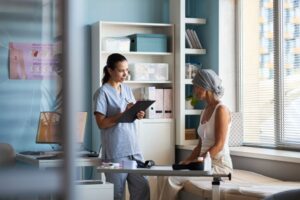 Cancer patient speaking with her doctor 